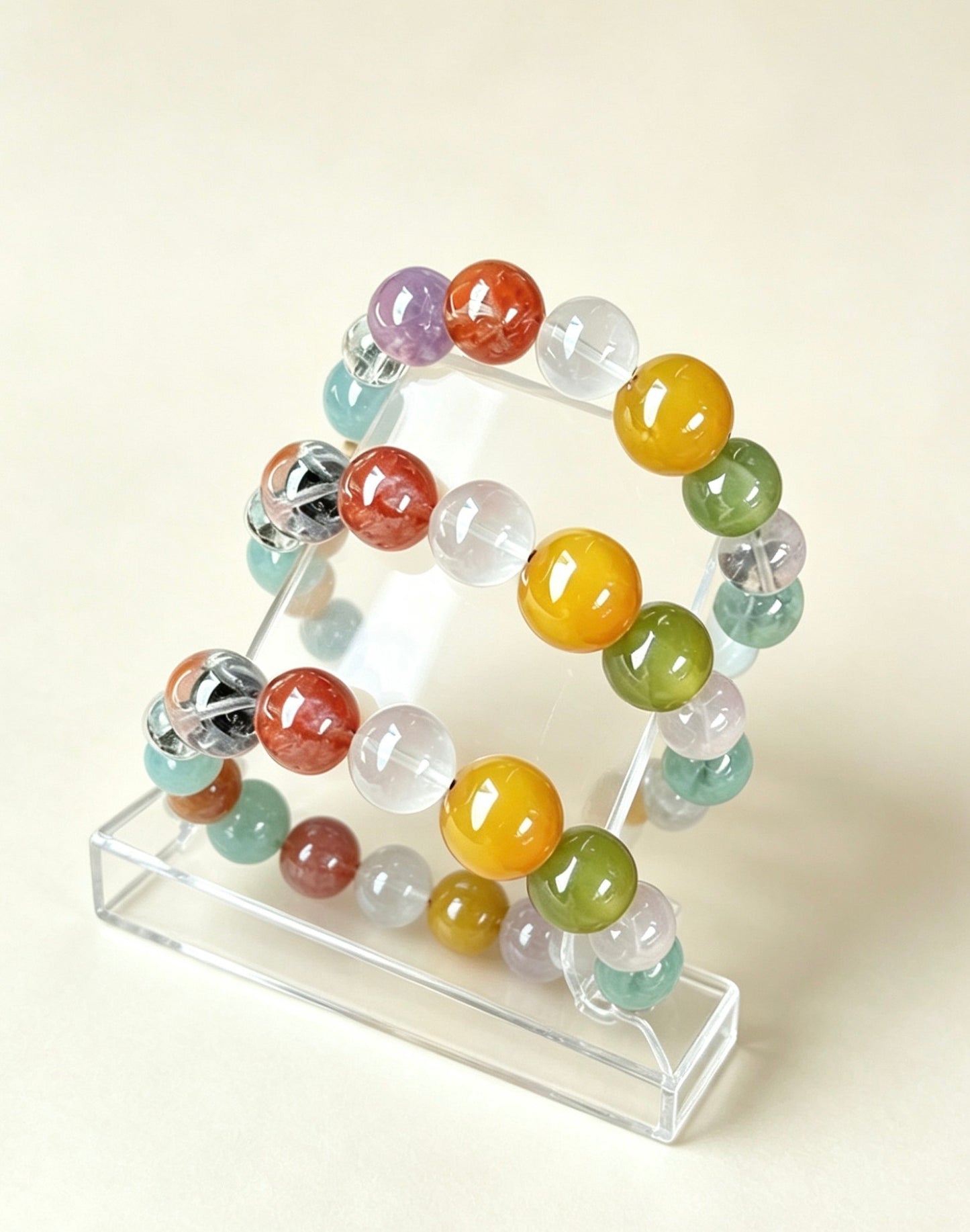 Amoria 10mm Natural Crystal Charm Bracelet | Attracts Wealth and Good Fortune · Balances Energy Fields · Protects Good Luck and Happiness